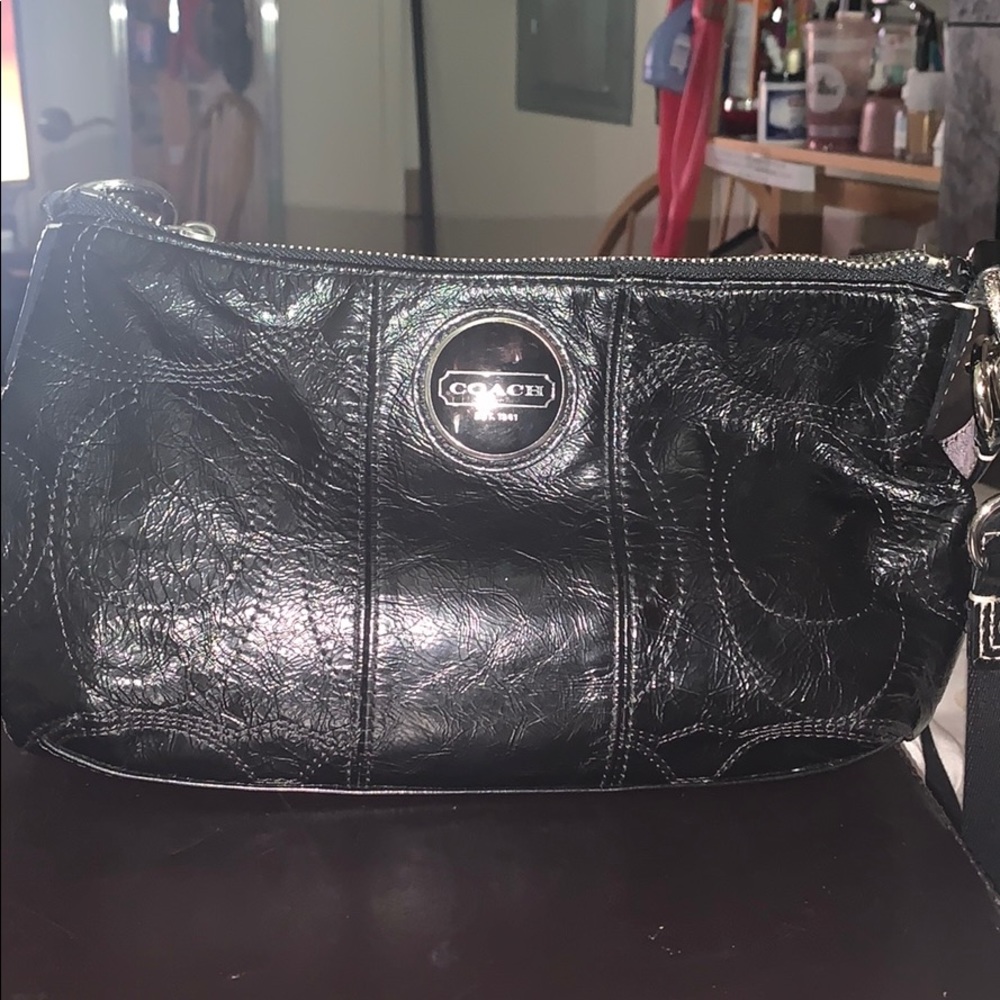 Black leather Coach Bag.